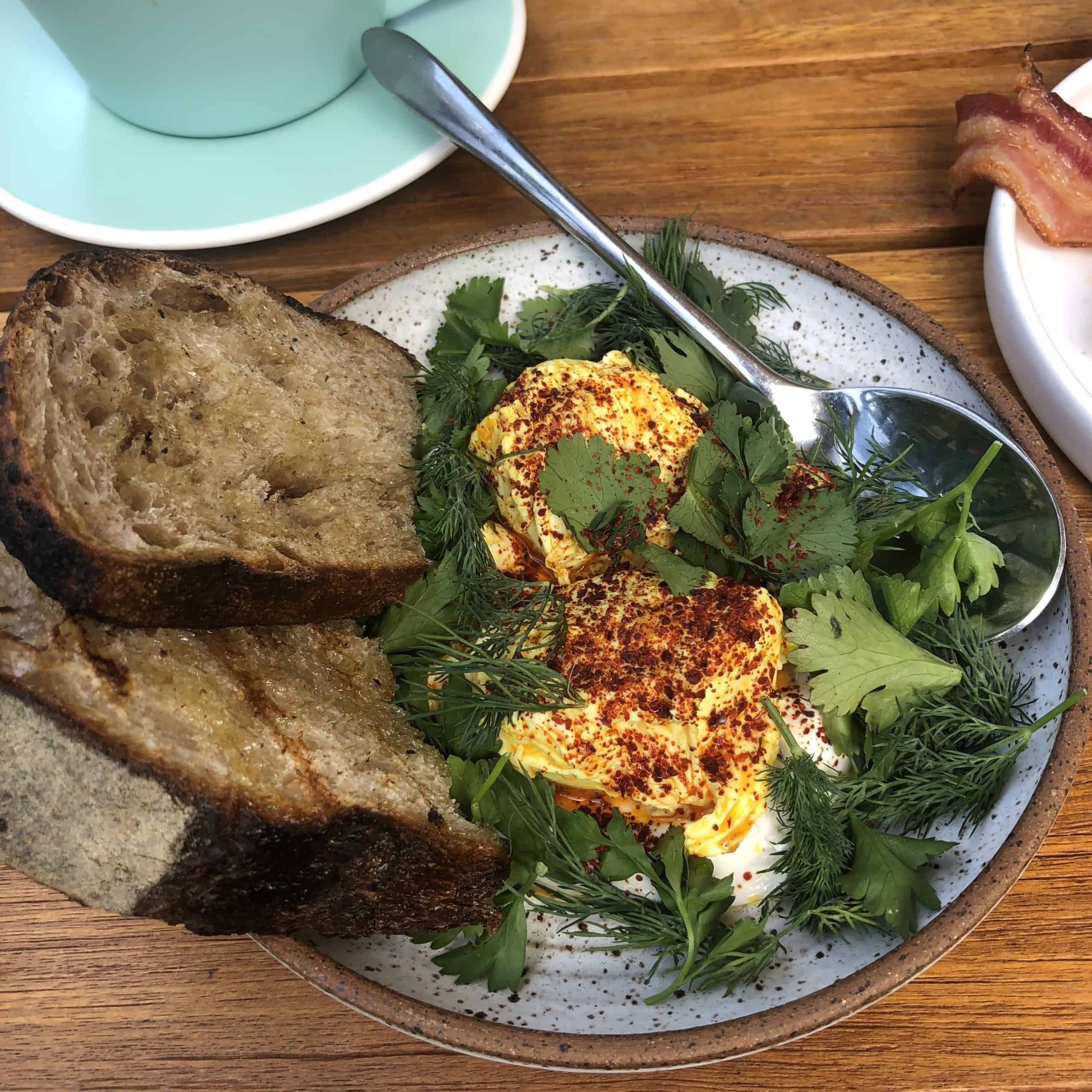 Turkish eggs from Mayfield in San Juan Capistrano with sourdough toast on the side
