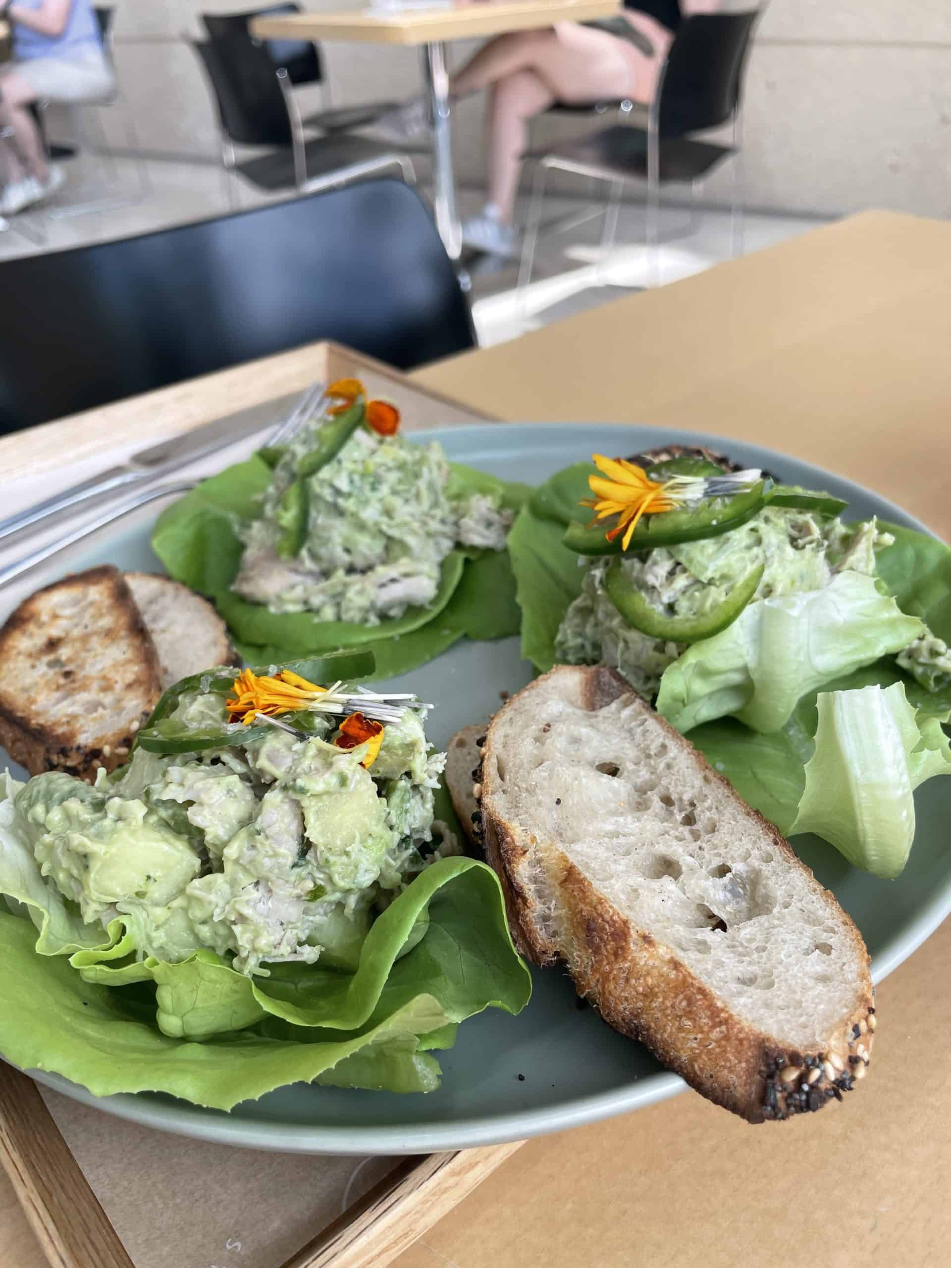 chicken salad on lettuce cups and sourdough bread at le clementine bakeshop in downtown st Pete