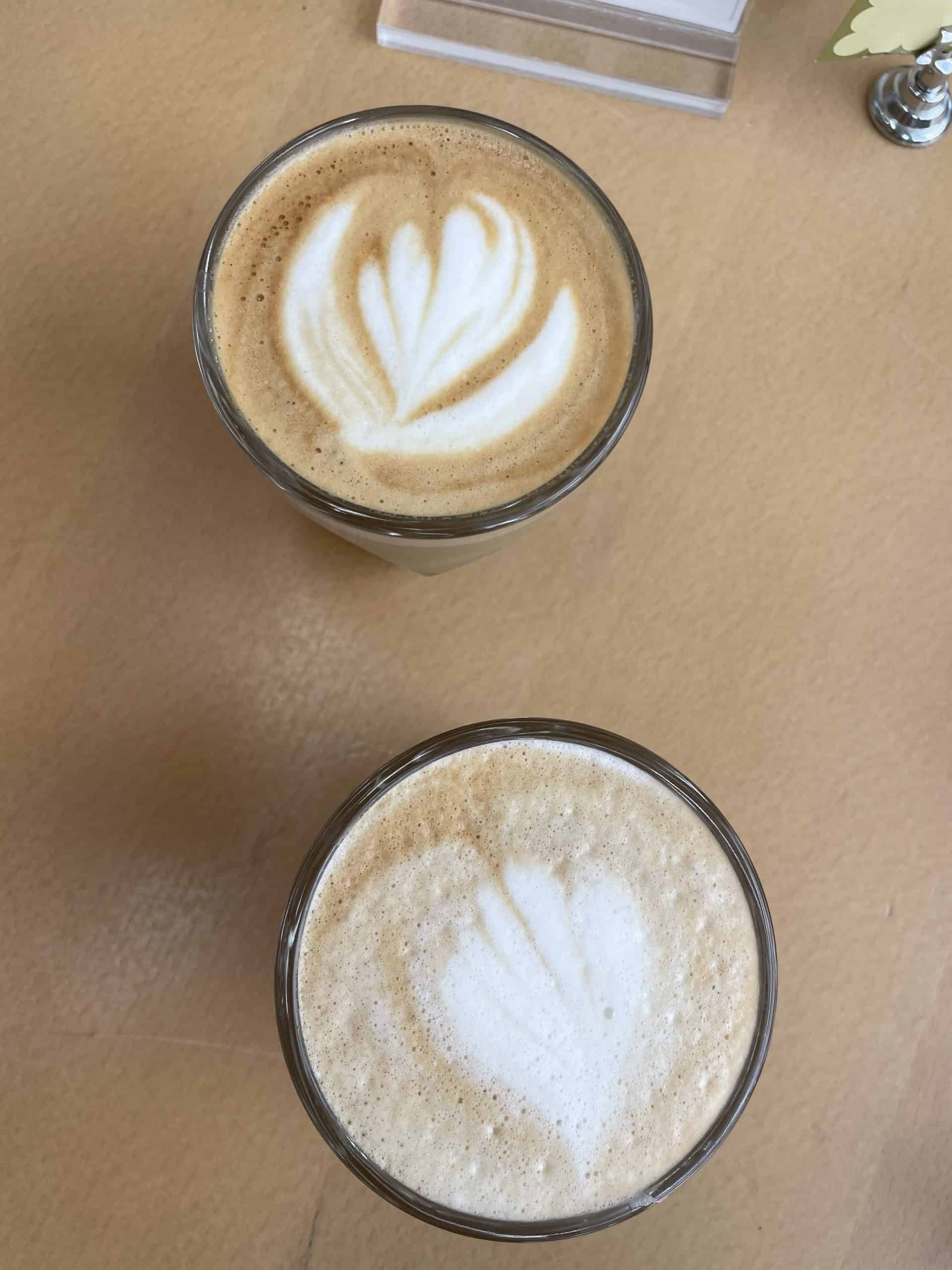 2 cappuccinos in glass cups at le clementine bakeshop in downtown st Pete